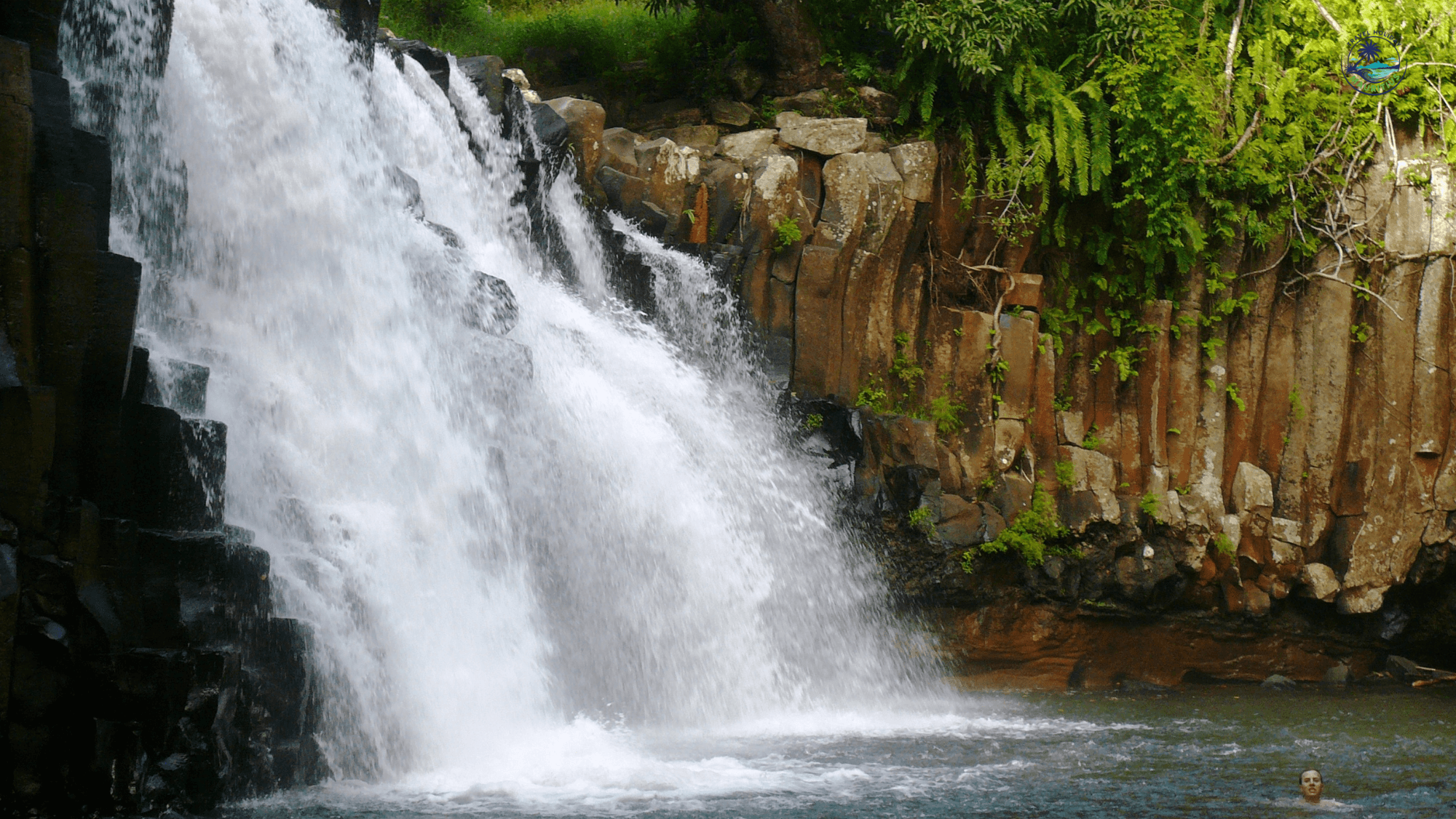 Private vehicle parked at a dramatic south Mauritius cliff viewpoint above the lagoon